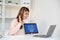 Young asian woman, english teacher holding digital tablet while teaching english language online class