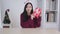 Young asian woman giving presents to camera with surprise at home, portrait happy female smiling and excited holding gift box.