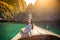 Young asian woman relax on long tail boat at Maya bay