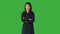 Young Asian Woman Standing Isolated on Green Screen Background