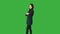 Young Asian Woman Standing Isolated on Green Screen Background