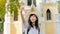 Young Asian woman traveler using mobile phone taking selfie in temple ayutthaya thailand, Travel Holiday Relaxation Concept