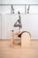 Young Asian woman working on pilates ladder barrel machine during her exercise training