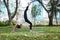 Young asian woman yoga outdoors keep calm and meditates while practicing yoga to explore the inner peace.