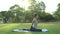 Young asian woman yoga outdoors keep calm and meditates while practicing yoga to explore the inner peace.