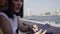 Young Asian women close friend tourist with casual enjoy with smartphone share photo in online social media in front of view port