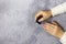 Young Asian women paint their own nail polish on the table at home.