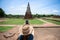 Young Asian women tourist taking photo picture with camera and traveling at Wat Chaiwatthanaram, ancient buddhist temple, famous