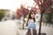 Young Asians girl with modern dress posing in an old Krakow