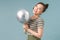 Young asians woman with balloon silver on white background