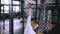 Young athlete doing exercises on the bar