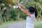 Young athlete woman streching in the park outdoor