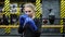 A young athletic boxer girl looks into the camera and prepares for a punch