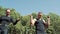 Young athletic couple jumping on the skipping rope outdoors