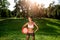 Young athletic girl concentrated on playing with plastic disc. Sport Concept.