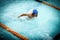 Young athletic man with butterfly swimming