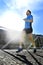 Young athletic man practicing running in urban background backlight in fitness sport training and healthy lifestyle concept