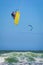 Young athletic man riding kite surf on a sea