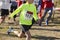 Young athletic runners on a race. Outdoor circuit.