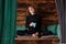 Young athletic woman is drinking tea after yoga training