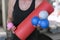 Young athletic woman holds equipment for MFR. Myofascial massage trainer. Different types myofascial rolls. Close up