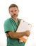 Young attractive and busy medicine doctor or nurse man holding clipboard medical paperwork on white background in health care and