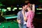 Young attractive couple on date in snooker club