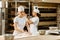 young attractive female bakers working together