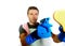 Young attractive and happy domestic house husband or single man holding sponge and detergent spray in washing gloves cleaning towa