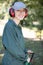 young attractive landscaper woman working in public park