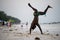 Young Attractive Muscular and Strong Athletic Black African Man at the White Sand Beach Training Body Calisthenics