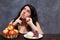 Young attractive overweight woman choosing between healthy food