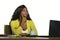 Young attractive and thoughtful black afro American business woman working at office computer desk looking away thinking relaxed i