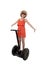 Young attractive tourist woman in chic summer dress smiling happy riding electrical segway