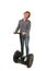 Young attractive tourist woman with red hair wearing jeans smiling happy riding electrical segway