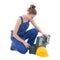 Young attractive woman builder in blue workwear with toolbox iso