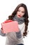 young attractive woman in scarf and arm warmers holding wrapped gift box,