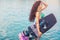 Young attractive woman with wakeboard