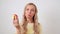 young attractive woman on a white background bites an apple. woman eating apple on white background