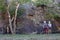 Young Australian people abseiling from a cliff in Brisbane Australia