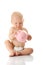 Young baby boy playing with pink piggy bank