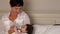 Young baby drinking from a milk bottle