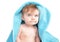 Young Baby Under Blue Towel on White