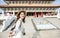 Young backpacker woman stand before traditional  chinese temple