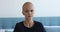 Young bald woman full of inner strength to fight cancer.