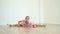 Young Ballerina Girl Is Tired And Lies On Floor