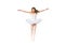 young ballerina with open arms jumping and looking down