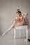 Young ballerina stands on pointes