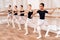 Young ballerinas rehearsing in the ballet class.