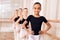 Young ballerinas rehearsing in the ballet class.